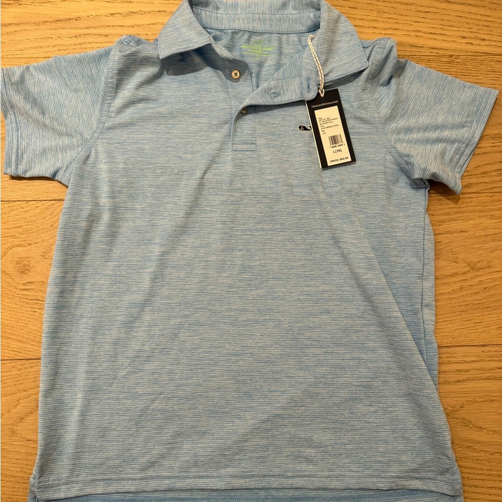 This is a light blue polo for boys.